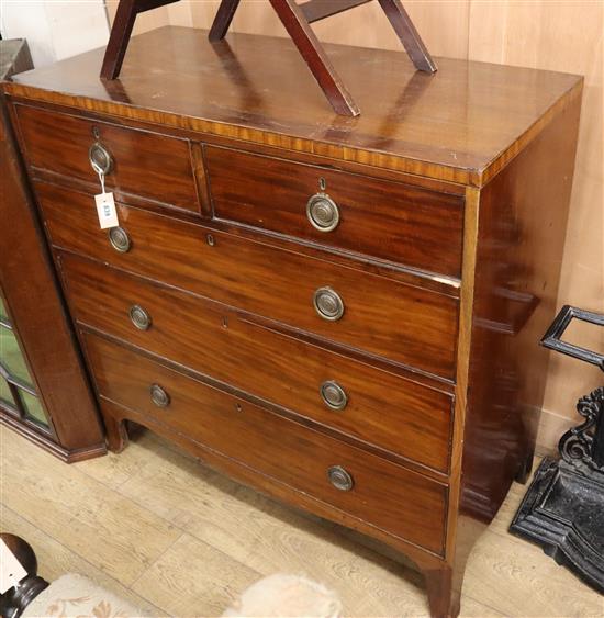 A George III mahogany chest fitted two short drawers and three graduated long drawers on outswept feet W.107cm
